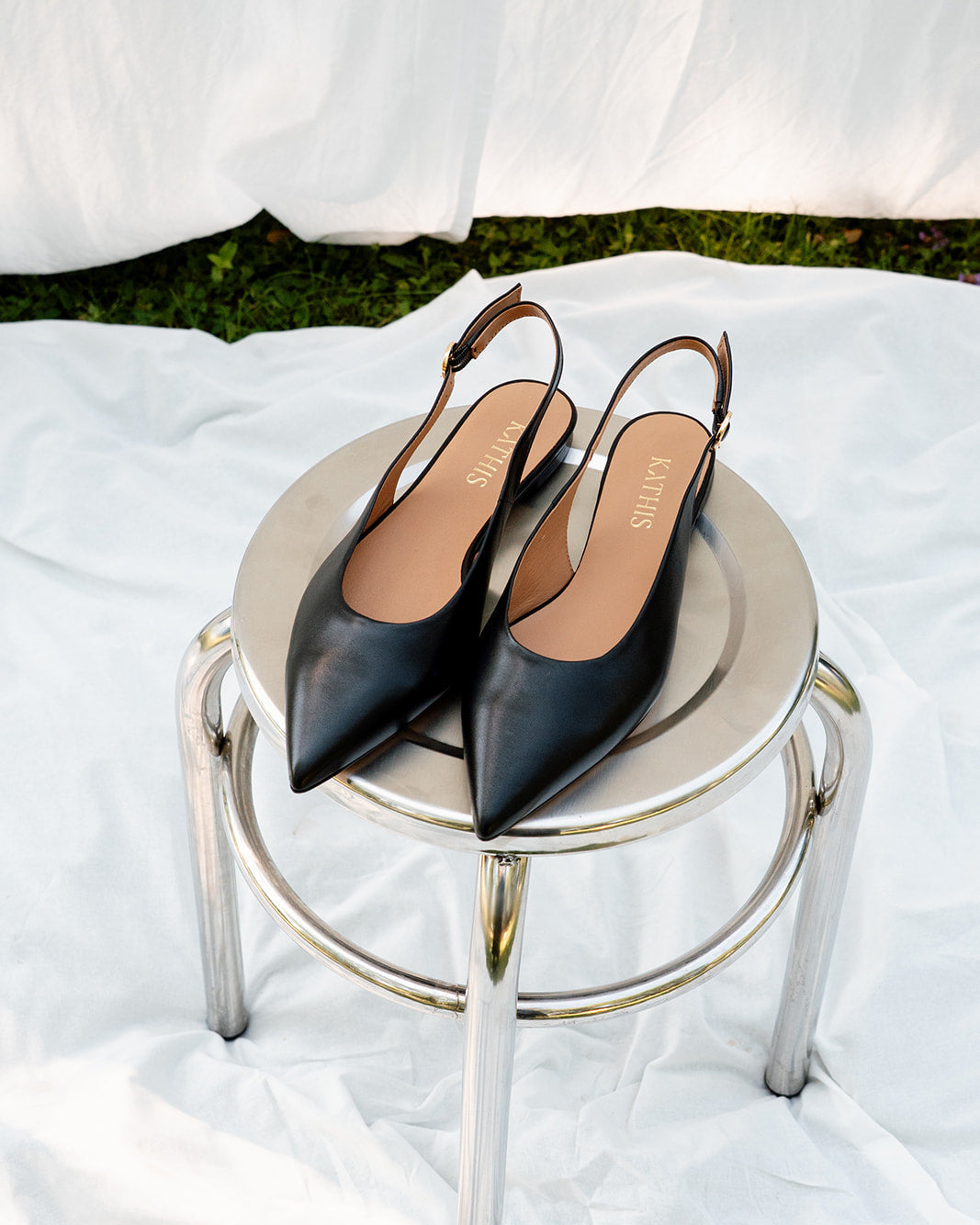 Slingback Ballerinas schwarz Seitenprofil elegante Form offene Ferse