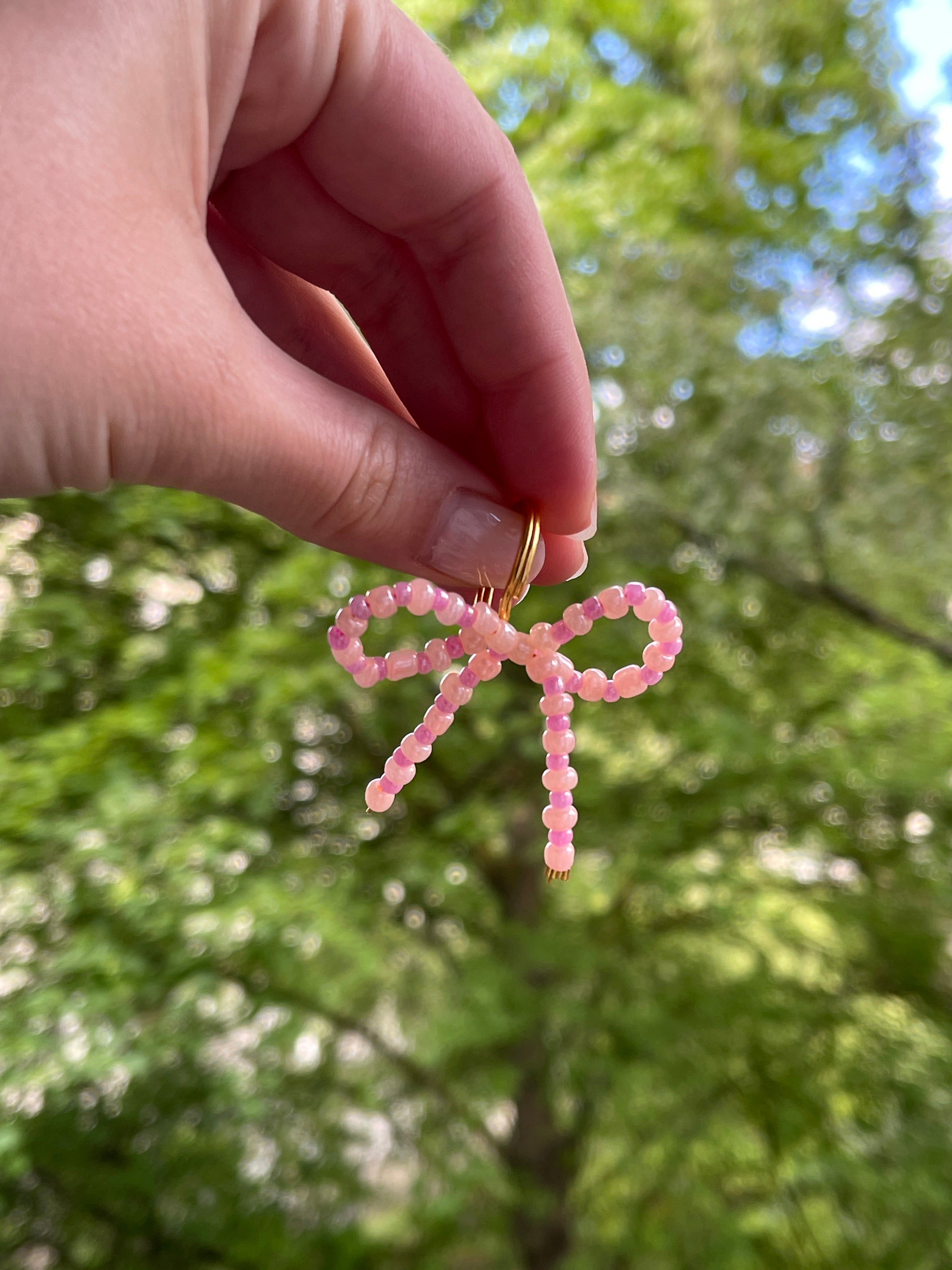 Schluesselanhaenger mit pinken Perlen